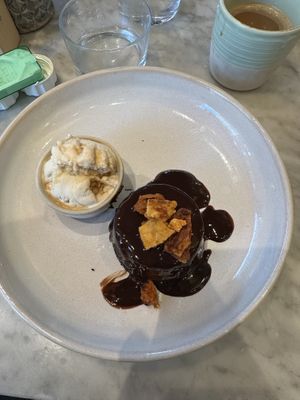 Dark chocolate pudding with vegan ice cream 🌱  at Mildreds - Covent Garden in London