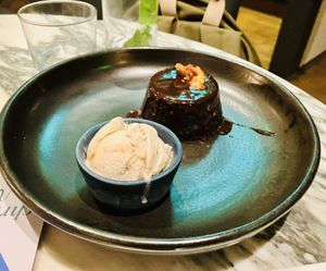 Dark chocolate pudding…honeycomb  ice cream 😋  at Mildreds - Covent Garden in London