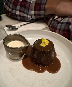Spiced sticky toffee pudding with vanilla nutmeg cream 😋  at Mildreds - Covent Garden in London