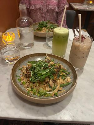 Dan dan noodles (£16.50, times 2), green juice (£6.50) and rose chai (£5.50). They also refill your complementary tap water whenever you run out.  at Mildreds - Covent Garden in London