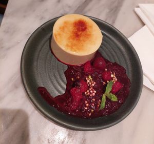 'crème brulee' - vanilla custard, morello cherry compote, pistachio puffed quinoa ($8) at Mildreds - Covent Garden in London