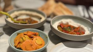 Mildred's sampler first course. Pickled Vegetables, vegetables taktouka whipped mascarpone, salsa macha hummus  at Mildreds - Covent Garden in London