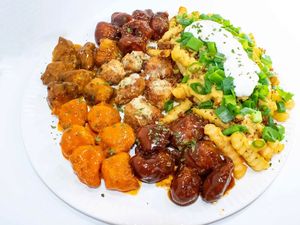 You can order a Lg Wing and mix up to 3 flavors. Add a loaded fry or two and now you got a party!! at Where It All Vegan in Gahanna