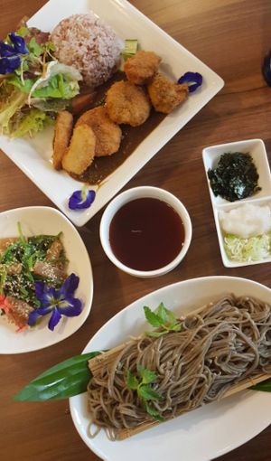 Soba Noodles with Spinach sesame salad and Curry with fried Veggie Nuggets.  at Sustaina in Bangkok