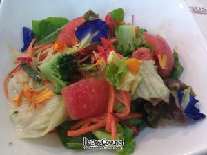 Beautiful salad with edible flowers at Sustaina in Bangkok