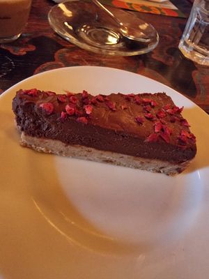 Chocolate - raspberry cake - vegan at Corzo Lounge in Reigate