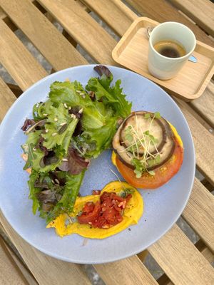 Scandinavian open toast with Ratatouille, carrot humus and green salad with cashew sauce at Flat in Lisbon