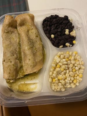 Spinach and mushroom enchiladas to go  at Pueblo in San Diego