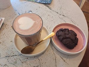 Mushroom magic coffee with cookie at Rise Plant Kitchen + Movement Studio in Malvern