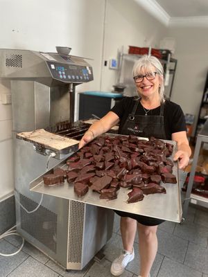 Happy Karen with raspberry honeycomb  at Güras Cacao in Mordialloc