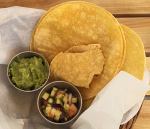 Corn tortilla and salsa and guacamole  at Loving Hut in Claremont