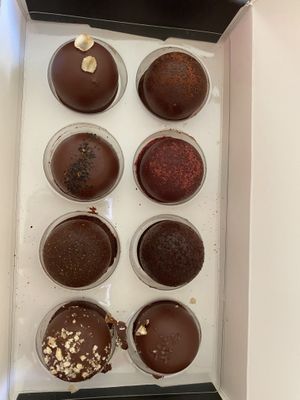 Box of truffles. Oat vanilla, raspberry, chia, spicy chili, and others  at Nibble Chocolate - Little Italy in San Diego
