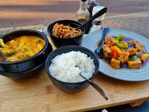 Curry and noodles with tofu and veggies at Restaurant The City in Eindhoven