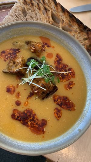Sweet potato lentil soup with chilli oil and sourdough toast  at Birch in Newcastle
