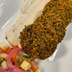 Falafel plate (5 house made falafels) w/ tahini sauce. (Vegan and gluten free) at Meze Morada in Islamorada