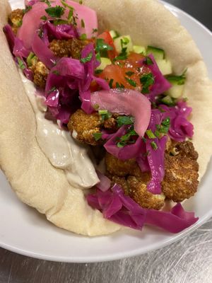Cauliflower pita sandwich. All sandwiches are made with scratch made pita baked daily in house.  at Meze Morada in Islamorada