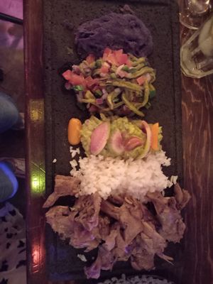 Tampico style mushroom carnitas

with rice, guacamole,nopales salad & beans at La Chicha in Mexico City