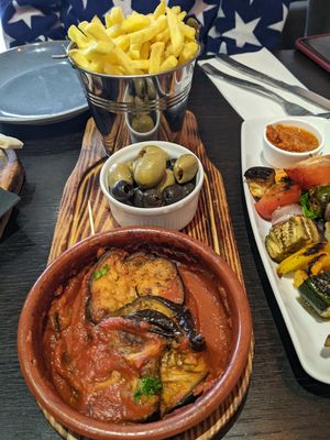 Baked aubergine, olives, fries at Central 42 in Beverley