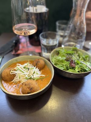 Indian dumplings with small lettuce salad   at Tula Bistro in Salzburg