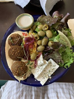 Falafel, hummus, feta, olives, salad, tahini dressing.  at Tula Bistro in Salzburg