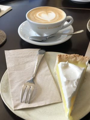 Cappuccino with oat milk and a wonderful lemon tarte  at Tula Bistro in Salzburg