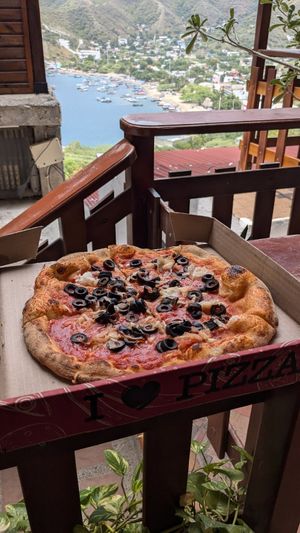 🍕 Pizza Marinara (without anchovies) 17k - toppings are extra 1k each (Olives & Onion's) at Fatto in Casa  in Taganga