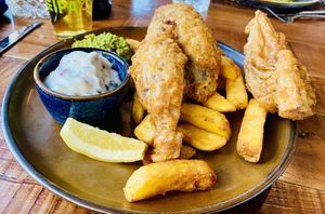 Great size tasty portion of Banana Blossom ‘fish &chips’ wonderful service as well! 😋🌻  at Rock Point Inn in Lyme Regis