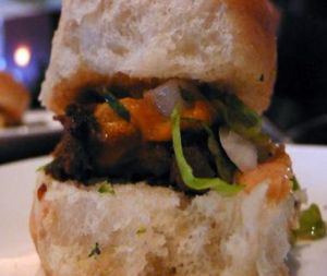 sublime sliders: cheddar, seitan steak, onion, romaine, gherkin, special sauce at Sublime Restaurant and Bar in Fort Lauderdale