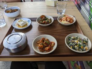 All vegan banchan selection, with rice and house-made tofu at Joodooboo in Oakland