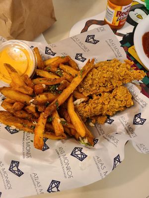 Chicken strips with garlic fries at Atlas Monroe in San Diego