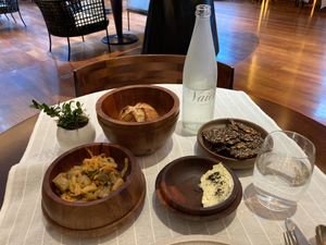 Bread service: bread, fermented veggies, vegan butter, crackers at Gioia Cocina Botánica in Buenos Aires