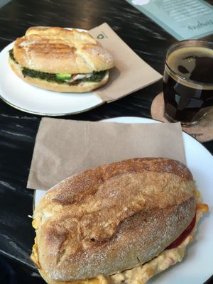 Flammkuchen-Panini und Tomate-Mozzarella-Panini, Kaffee Americano  at Hempies - Händelstraße in Cologne