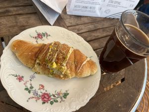 Pistachio Croissant and Americano  at Hempies - Händelstraße in Cologne
