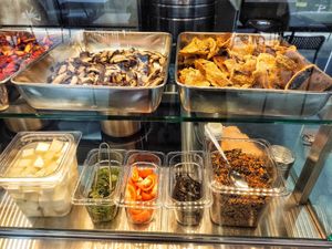 Dishes available at Makan Vegan - 斋这里 in Central Singapore