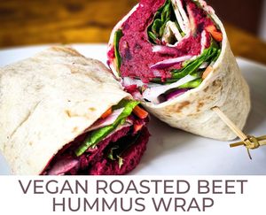 Vegan Roasted Beet Hummus, Carrots, English Cucumbers, Red Onion and Mixed Greens in a Wrap. at The Café in Little Falls
