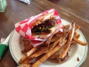 Burger w hummus  at Vegeria - Viva Book Complex in San Antonio