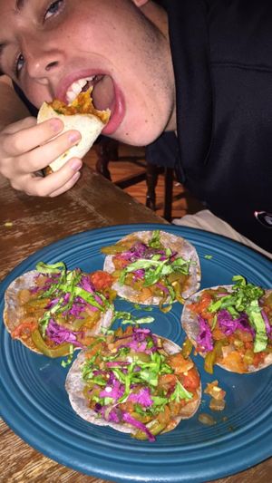 Jake enjoying the napoles tacos! at Vegeria - Viva Book Complex in San Antonio
