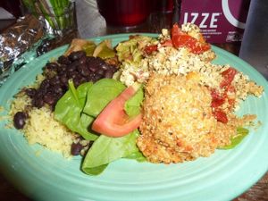 
Delicious vegan eats. Lemon rice, black beans, chips with avocado sauce, spinach tomato salad, cilantro pesto pasta salad, sundried tomato basil tofu, roasted red pepper quinoa grits. at Vegeria - Viva Book Complex in San Antonio