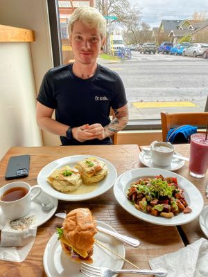 Bright window seating on a gloomy day.   at Rabbits Cafe - Killingsworth in Portland