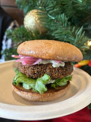 Ms.D’s falafel burger with house made tzatziki sauce and hummus.  at The Station Bistro in Conway