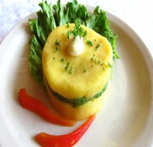 CAUSA Limeiñ
Layers of chilled mashed potato seasoned with aji amarillo and lime juice dressing; filled with sliced avocado. at Aji Peruvian Restaurant in Ooltewah