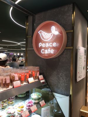 Store sign at Peace Cafe - Shibuya Tokyu Food Show in Tokyo