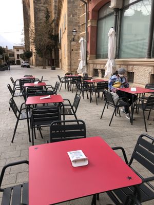Outdoor seating with view onto the market place  at El Hummus in Mallorca