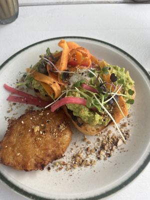 smashed avocado on sourdough + potato hash  at Kinsfolk in Rockhampton