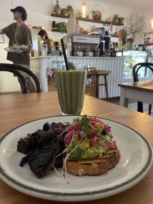 A gorgeous avo on sourdough and mushies! Love the cashew cream and pickled onions! And had to take half the Macha smoothie home as soooo filling and scrumptious!!   at Kinsfolk in Rockhampton