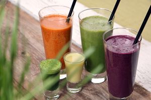 Healthy smoothies and shots – protein, green, superfood, wheatgrass shot and turmeric shot.  at The Beginnings - Skolas in Riga