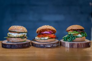 Healthy burgers with falafel, tofu and avocado.  at The Beginnings - Skolas in Riga