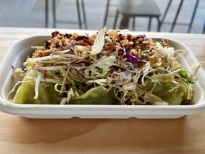 Vegan dumplings topped with vegan slaw   at The Rolling Pin in Auckland