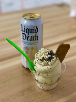 Vanilla with yellow curry, toasted coconut, and cashews topped with poppy seeds and biscoff cookie   at Oh Yeah Creamery in Tampa