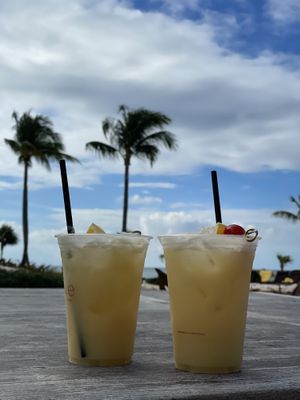 Pineapple coconut drinks from the bar inside. So good!  at Cascades in Nassau